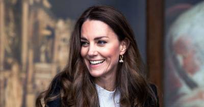 Duchess Kate Wears Preppy Black Suit to St Andrews — Nearly 20 Years After Modeling Her Iconic Sexy Sheer Dress - www.usmagazine.com - Scotland - city Holland - county Cooper