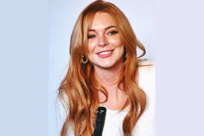 Lindsay Lohan Returns To Acting in Upcoming Netflix Holiday Film - www.hollywood.com