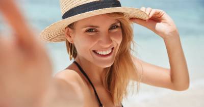 These Summer Hats Have Built-In SPF and Anti-Aging Properties - www.usmagazine.com