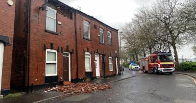 House partially collapses, fallen tree blocks Metrolink line and trampoline blows over as high winds BATTER region - www.manchestereveningnews.co.uk - Manchester - county Oldham