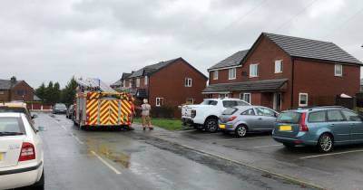 Man treated by paramedics at scene of house fire in Bury - www.manchestereveningnews.co.uk