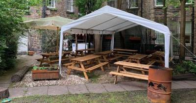Scots bar sparks fury as locals wake up to makeshift beer tent in communal garden - www.dailyrecord.co.uk - Brazil - Scotland