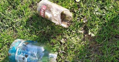 Parents horrified as broken glass bottles discovered buried in children's football pitch - www.manchestereveningnews.co.uk