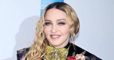 Madonna Just Got a Red ‘X’ Inked on Her Arm — and She Drank Wine to Numb the Pain - www.usmagazine.com
