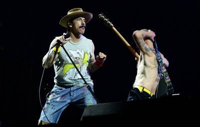 Red Hot Chili Peppers to sell songwriting catalogue in £100million deal - www.nme.com