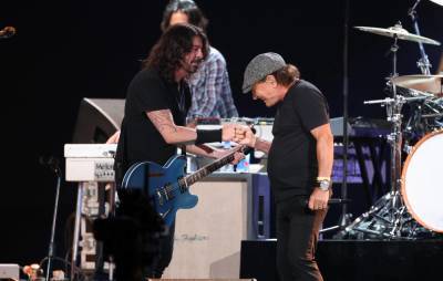 Watch Foo Fighters team up with Brian Johnson to cover AC/DC’s ‘Back In Black’ - www.nme.com - Los Angeles