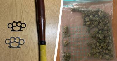 Baton, knuckledusters and stashes of drugs discovered as police intercept car - www.manchestereveningnews.co.uk - Manchester