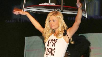 Paris Hilton Says Her 'Stop Being Poor' Shirt Was Photoshopped - www.etonline.com