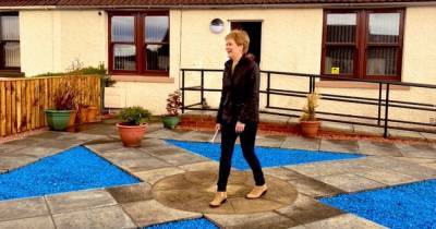 Nicola Sturgeon impressed by huge saltire design created in garden of Scots home - www.dailyrecord.co.uk - Scotland