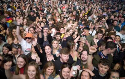 Survey finds 75% of music fans are happy to return to live music with COVID certification - www.nme.com - Britain