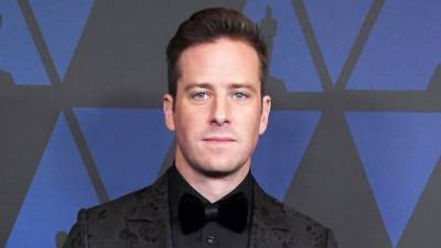 Armie Hammer Returns to Cayman Islands as Elizabeth Chambers Takes Things Day by Day - www.etonline.com - county Chambers - Cayman Islands