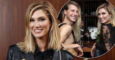 Delta Goodrem nails edgy-chic in a leather jacket during outing - www.msn.com - Britain