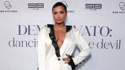 Demi Lovato Drops Two Heartbreaking Unreleased Songs From Past Album: Listen - www.etonline.com