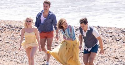 Emma Corrin - David Dawson - Harry Styles, Emma Corrin and David Dawson Skip Down the Beach on ‘My Policeman’ Set: Pics - usmagazine.com