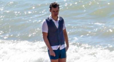 Harry Styles Films a Beach Scene for 'My Policeman' Movie with Emma Corrin - www.justjared.com - city Brighton