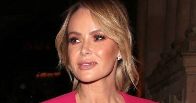 Amanda Holden wows in bold orange swimsuit as she reveals exciting news - www.msn.com