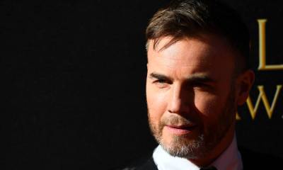 Gary Barlow sparks huge fan reaction with unbelievable throwback photo - hellomagazine.com