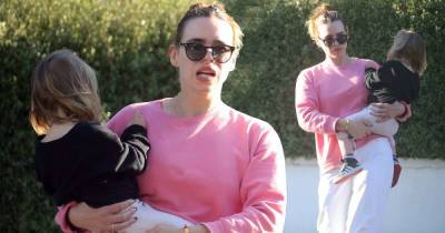 Billie Piper cradles daughter Tallulah, two, during low-key outing - www.msn.com