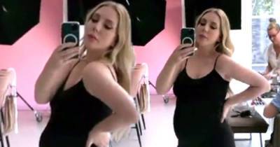 Pregnant Katherine Ryan shows off her baby bump in a black maxi dress - www.msn.com
