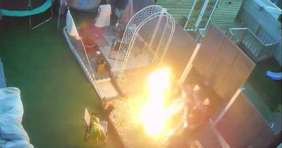 Moment neighbour's quiet BBQ descended into chaos as petrol can explodes - www.manchestereveningnews.co.uk