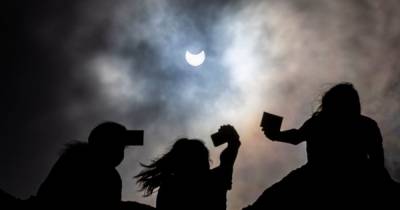 Stargazers lined streets as 'ring of fire' solar eclipse looked over Scotland - www.dailyrecord.co.uk - Scotland - state Alaska - Greenland