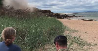 Bomb squad race to Scots beach as dramatic footage shows wartime shell being detonated - www.dailyrecord.co.uk - Scotland