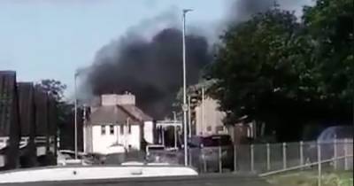 Dramatic footage shows huge plume of smoke erupt as blaze breaks out on Scots street - www.dailyrecord.co.uk - Scotland