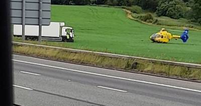 Air ambulance scrambled as lorry crashes off the M56 - www.manchestereveningnews.co.uk - county Cheshire