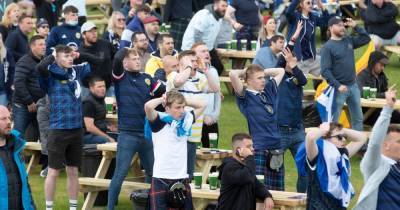 Tartan Army fans at fanzone down but not out despite Scotland’s dreaded loss - www.dailyrecord.co.uk - Scotland