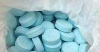 Woman released on bail over £250k blue plague pills bust claims - www.dailyrecord.co.uk - Scotland