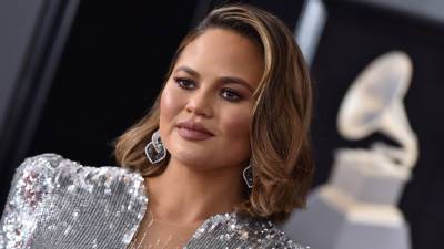 Chrissy Teigen reveals new ink honoring daughter's pre-school graduation in first post after apology - www.foxnews.com