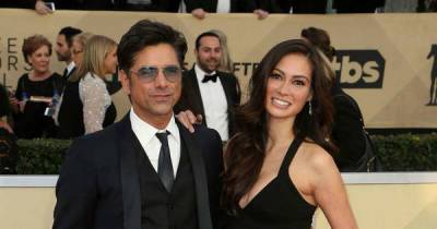 John Stamos and wife Caitlin McHugh volunteer for food banks ahead of Father's Day - www.msn.com - Los Angeles