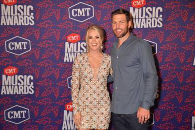 Carrie Underwood’s Husband Mike Fisher Appropriately Goes Catfish Noodling - etcanada.com