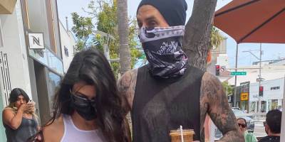 Travis Barker Wraps Protective Arm Around Kourtney Kardashian During Quick Coffee Run - www.justjared.com - Los Angeles