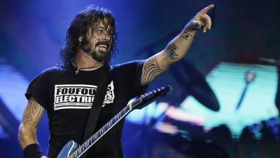 Anti-Vaccine Protesters Picket Outside Foo Fighters’ First Full Capacity Show Since Pandemic - variety.com