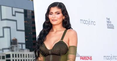 Kylie Jenner Was Hand-Sewn Into Her Vintage Dress for Red Carpet Appearance With Travis Scott, Stormi - www.usmagazine.com - New York
