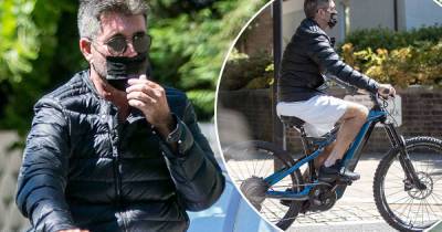Simon Cowell enjoys a low-key cycle ride in London - www.msn.com - Britain - London