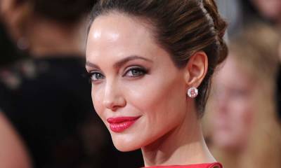 Angelina Jolie reveals cryptic new tattoo amid Brad Pitt custody battle - hellomagazine.com - Britain - New York
