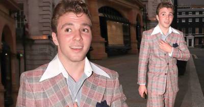 Rocco Ritchie sports rockabilly hairdo and 1950s-style checked suit - www.msn.com
