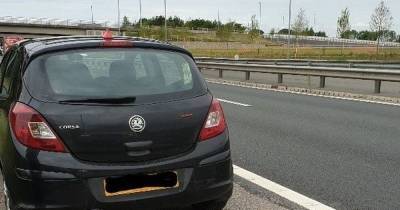 Driver fined for parking on M56 hard shoulder while waiting to pick family up from Manchester Airport - www.manchestereveningnews.co.uk - Manchester