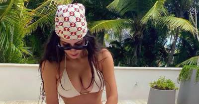 Will Kim Kardashian Keep Posting Sexy Bikini Pics After Becoming a Lawyer? She Says … - www.usmagazine.com