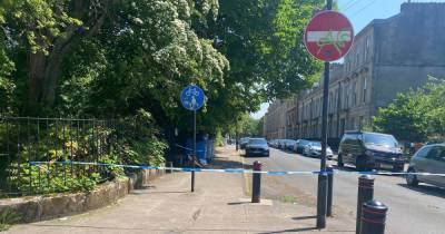 Forensic officers swarm Glasgow home as cops lock down street after 'suspicious' death of woman - www.dailyrecord.co.uk