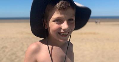Stockport boy's foot 'melted like wax' after stepping on hot sand at Formby beach - www.manchestereveningnews.co.uk