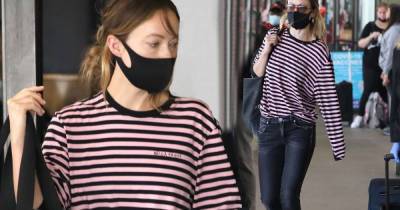 Olivia Wilde cuts a casual figure in a pink and black stripy top in LA - www.msn.com - London - Los Angeles