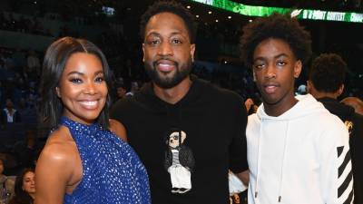 Dwyane Wade's Son Zaire Blasts the 'Hate' His Dad Receives for Being 'True to His Family' - www.etonline.com