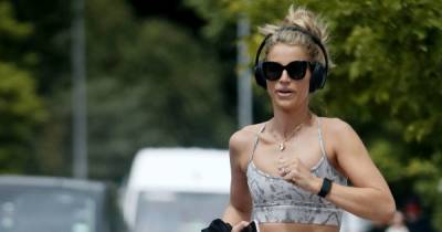 Vogue Williams shows off taut abs in crop top as she goes running with her dog - www.ok.co.uk - London