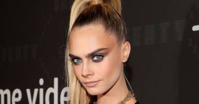 Cara Delevingne Almost Got Plastic Surgery on Her ‘Uneven’ Boobs — Here’s What Stopped Her - www.usmagazine.com - Hollywood