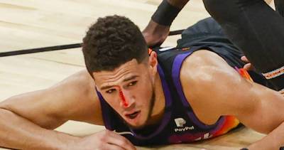 NBA Star Devin Booker Had His Nose Busted Open During NBA Game - www.justjared.com