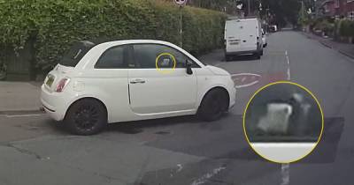 Driver seen swerving in the road and almost crashing as they 'drank coffee and checked her phone' - www.manchestereveningnews.co.uk