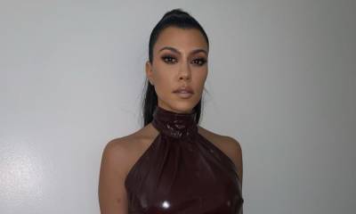 Kourtney Kardashian flashed her bejeweled teeth in sexy lingerie - us.hola.com